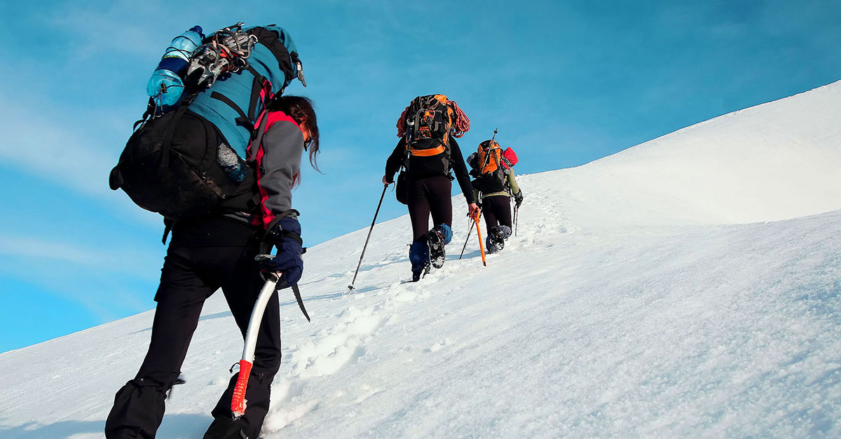 Alpinists ascending a slope